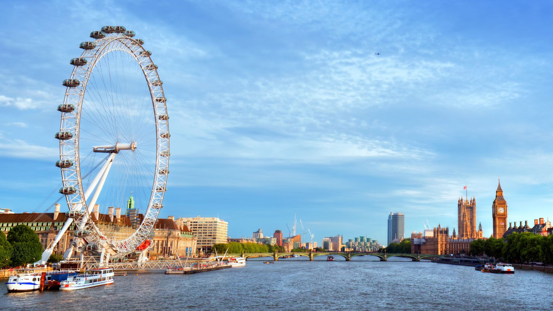 Photograph of London landscape in the UK, featuring the London Eye and Big Ben