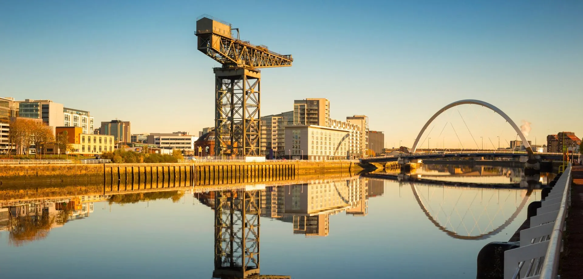 Evening winter light on the Finniestone Crane and Finnieston Bridge on the River Clyde, Glasgow